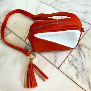 Mersi orange and white vegan leather cross body mini purse